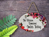 "Be the Reason Someone Smiles Today” | Oval Ceramic Wall Sign | 8 3/4" x 6” x 5/16”