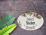 "Coolest Teacher Ever” | Oval Ceramic Wall Sign | 8 3/4" x 6” x 5/16”