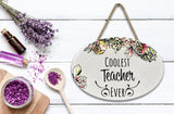 "Coolest Teacher Ever” | Oval Ceramic Wall Sign | 8 3/4" x 6” x 5/16”