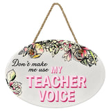 "Don't Make Me Use My Teacher Voice” | Oval Ceramic Wall Sign | 8 3/4" x 6” x 5/16”
