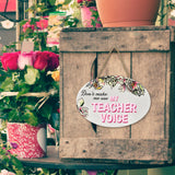 "Don't Make Me Use My Teacher Voice” | Oval Ceramic Wall Sign | 8 3/4" x 6” x 5/16”