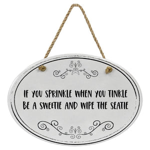 "If You Sprinkle When You Tinkle Be A Sweetie And Wipe The Seatie” Black & White | Oval Ceramic Wall Sign | 8 3/4" x 6” x 5/16”