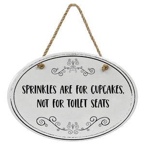 "Sprinkles Are For Cupcakes, Not For Toilet Seats” Black & White | Oval Ceramic Wall Sign | 8 3/4" x 6” x 5/16”