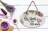 "It Takes a Big Heart To Shape Little Minds” | Oval Ceramic Wall Sign | 8 3/4" x 6” x 5/16”